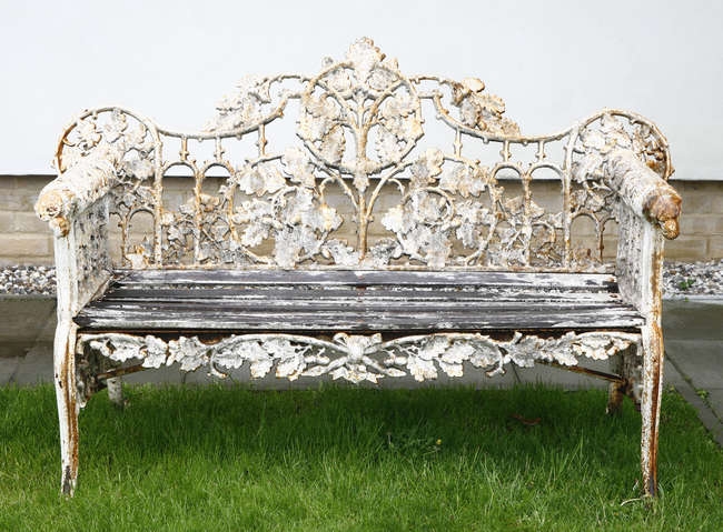 A Coalbrookdale design cast iron garden bench