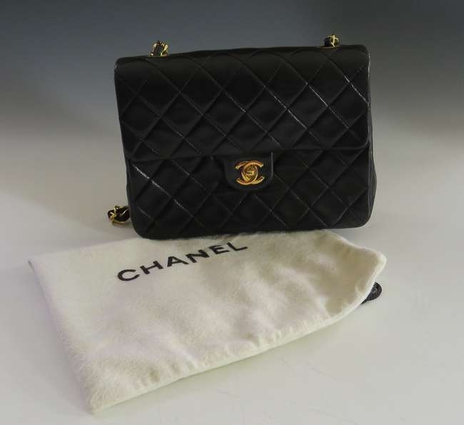A Chanel vintage black quilted lambskin medium flap shoulder bag