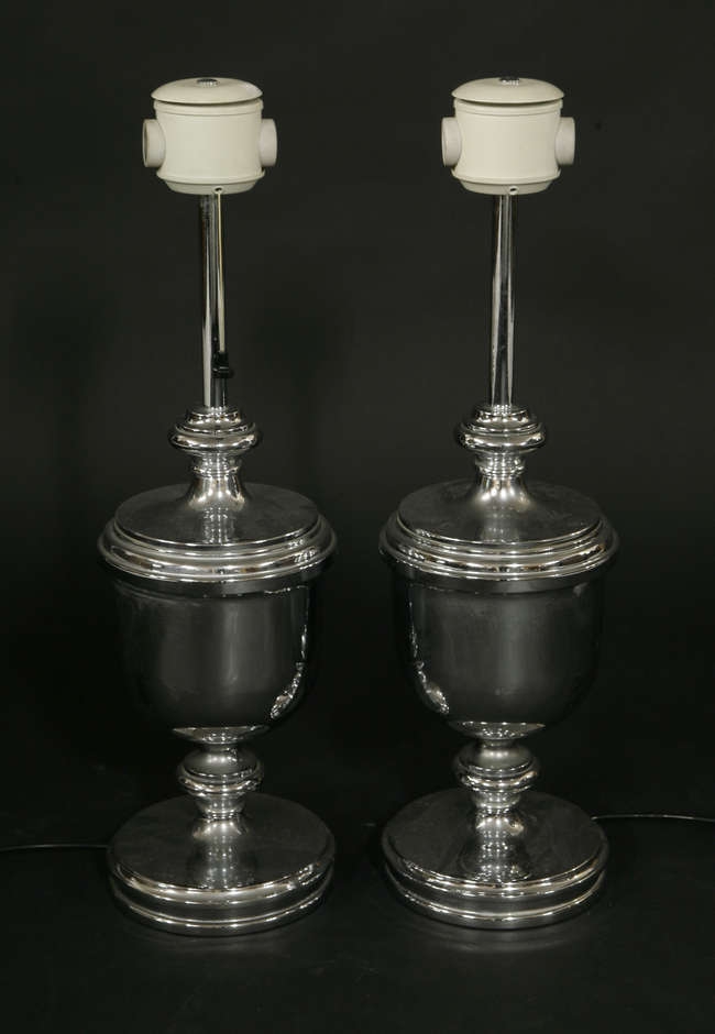 A pair of chrome urn shaped table lamps