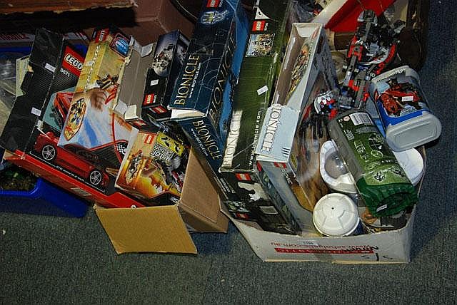 2 boxes containing various boxed Lego pieces etc