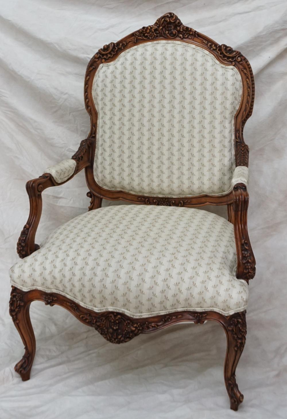 CARVED ANTIQUE FRENCH ARMCHAIR