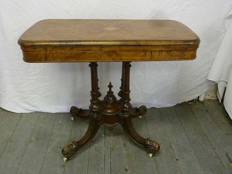 A late 19th century Walnut and mahogany card table