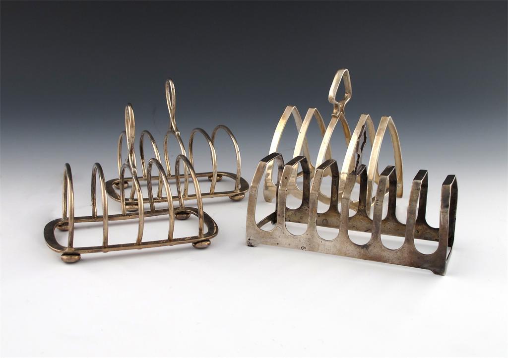 A pair of Edwardian silver five-bar toast racks