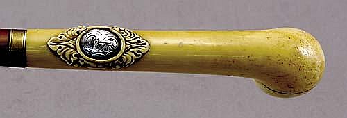 Carved ivory-handled walking stick