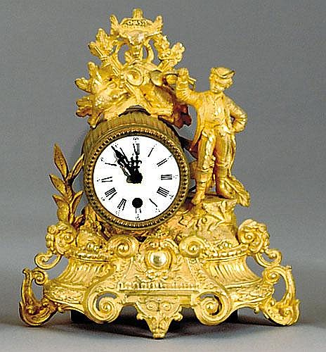 French gilt metal mantel clock