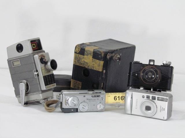 Movie Camera And Four Cameras