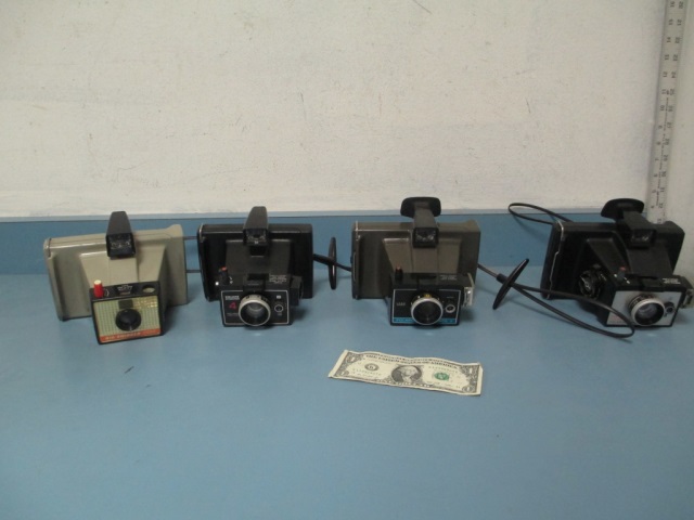 4 Polaroid Instant Land Cameras