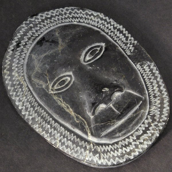6710: Carved stone Inuit mask