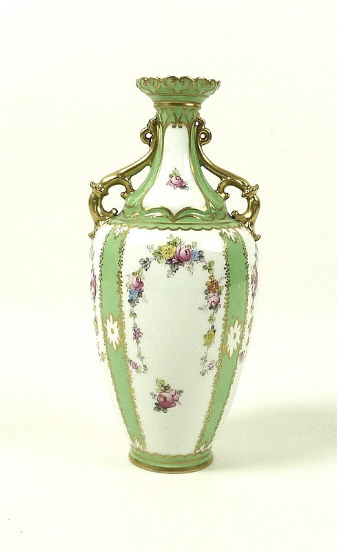 A late Victorian Royal Crown Derby porcelain twin handled vase with flared rim