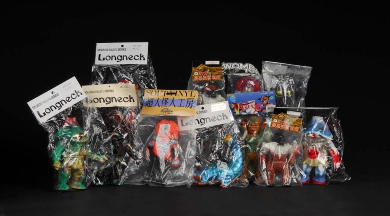 Large Lot of Vinyl Figures.