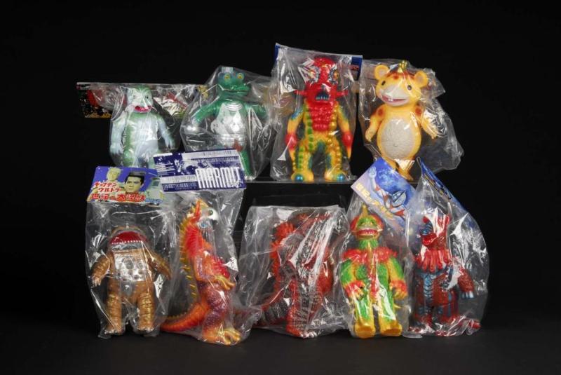 Large Lot of Vinyl Figures.