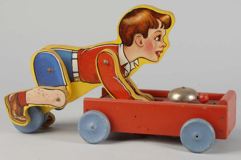 Paper on Wood Fisher Price Coaster Boy Toy.
