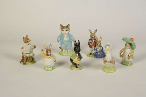 A MISCELLANEOUS LOT OF BEATRIX POTTER GLAZED POTTERY FIGURINES, comprising