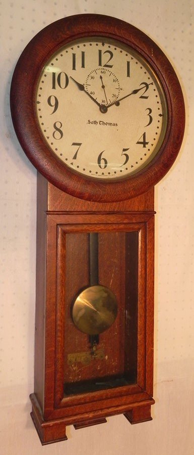Seth Thomas oak regulator wall clock. 36" tall