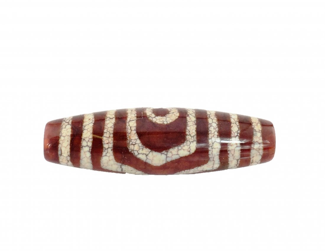 A three eyes tibetan agate dzi bead