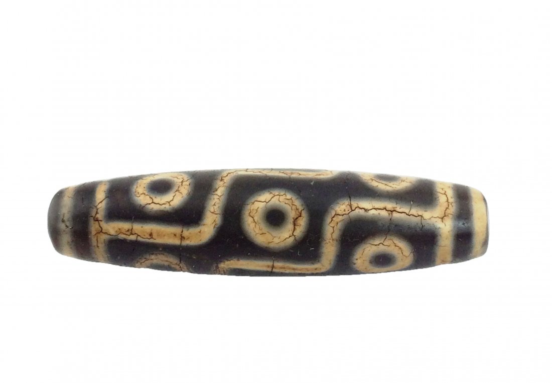 A nine eyes tibetan agate dzi bead