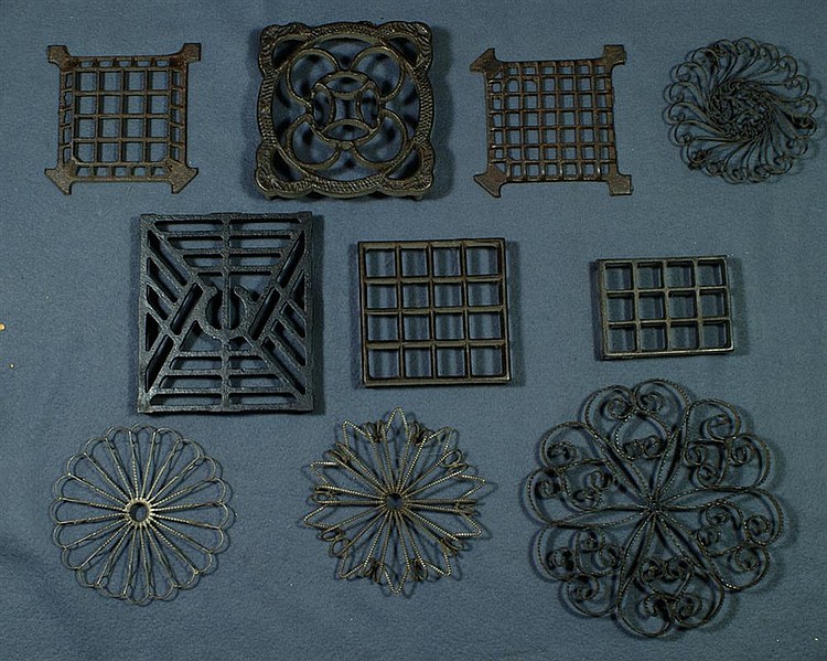 Lot of 6 square cast iron trivets and 4 round wrought iron trivets