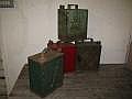 A group of four assorted two gallon petrol cans