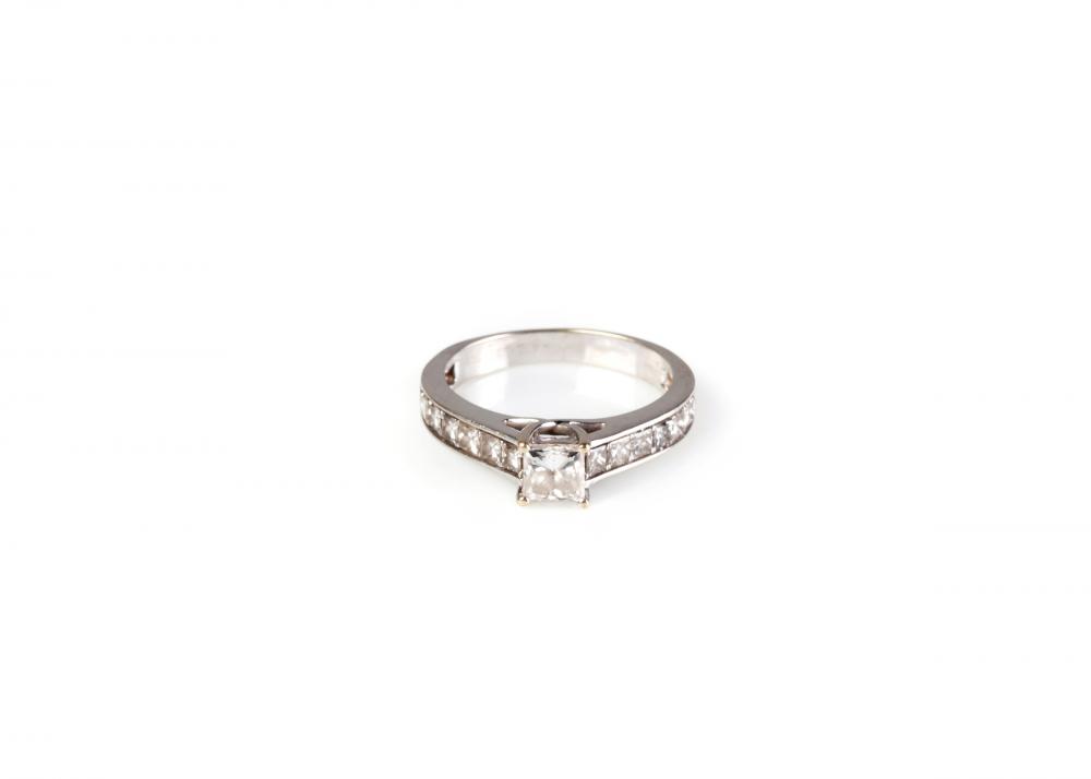 A princess cut diamond engagement ring, with six princess cut diamonds