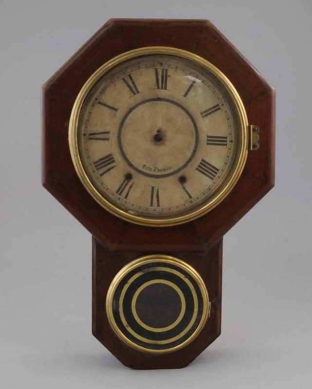Seth Thomas, a late 19th Century American walnut drop dial wall clock