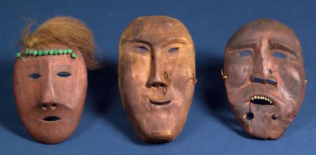 Three Carved Wood Inuit Masks