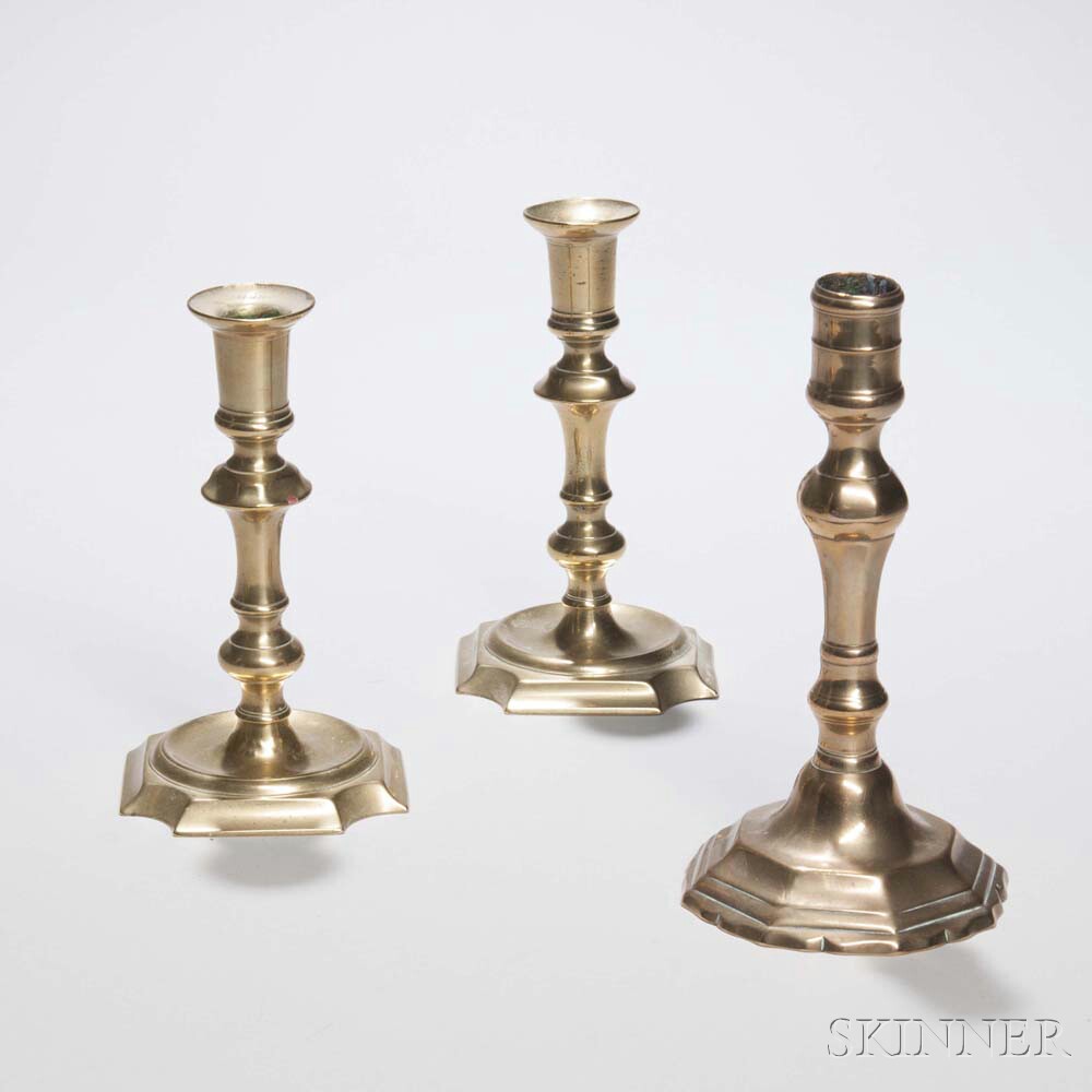 Pair of Brass Candlesticks and a Single Bell Metal Candlestick