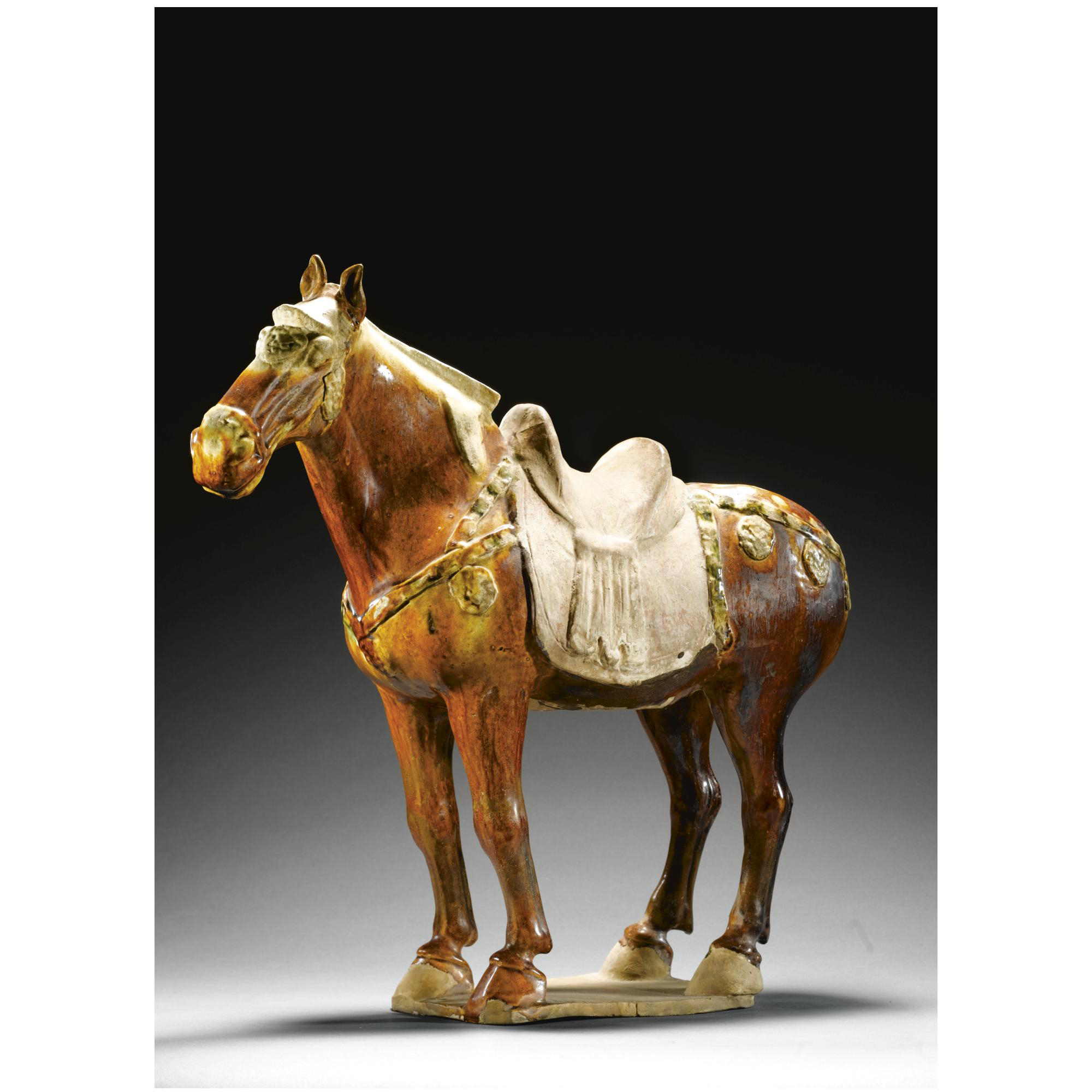 A SANCAI-GLAZED POTTERY HORSE, TANG DYNASTY