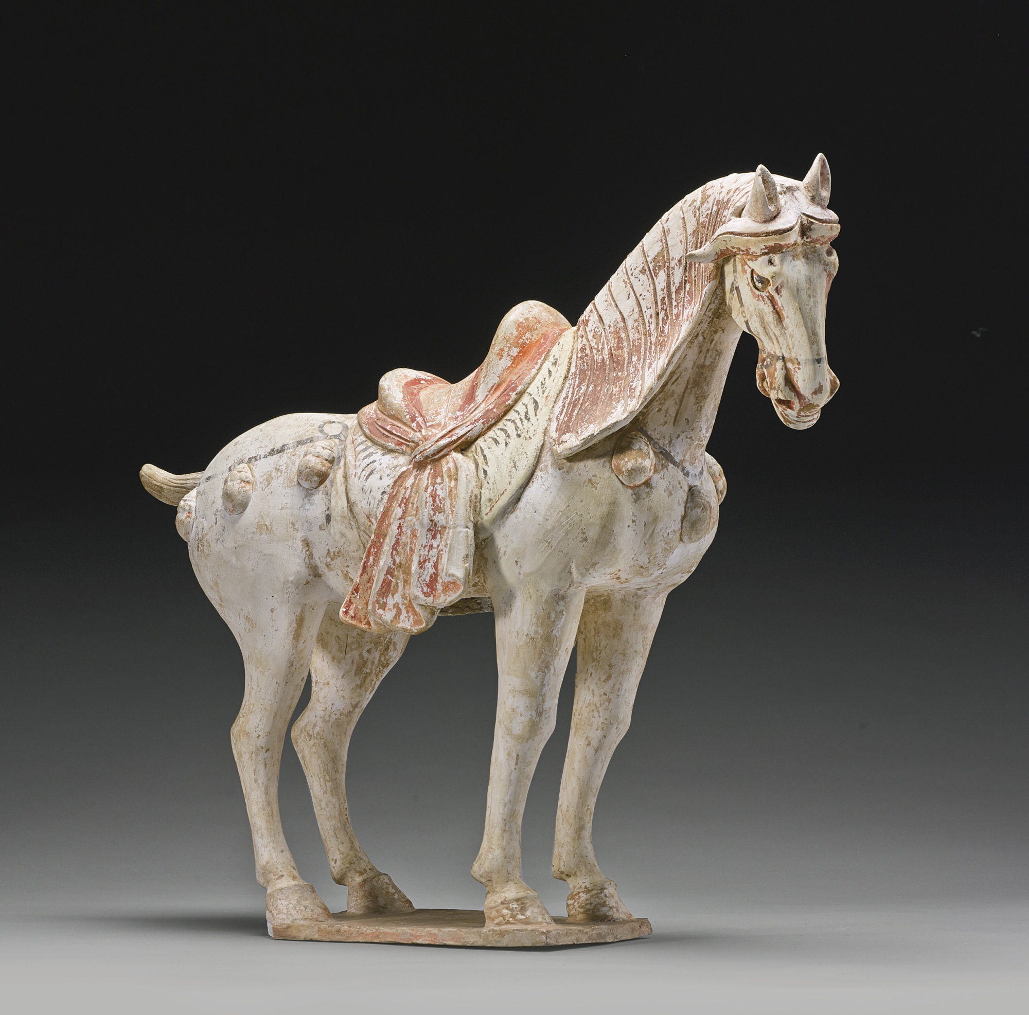 A painted pottery figure of a horse tang dynasty