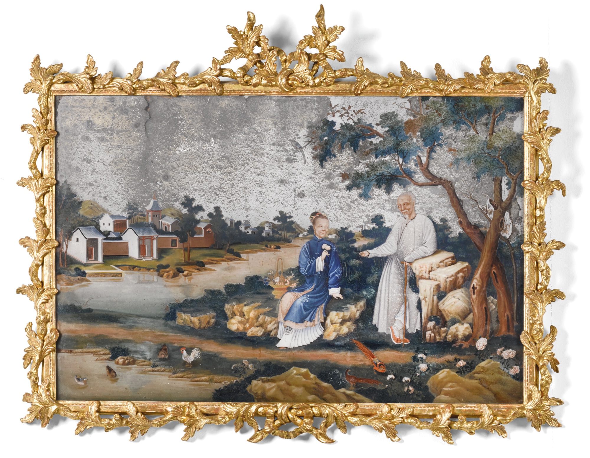 A chinese export reverse painted glass mirror, mid 18th century