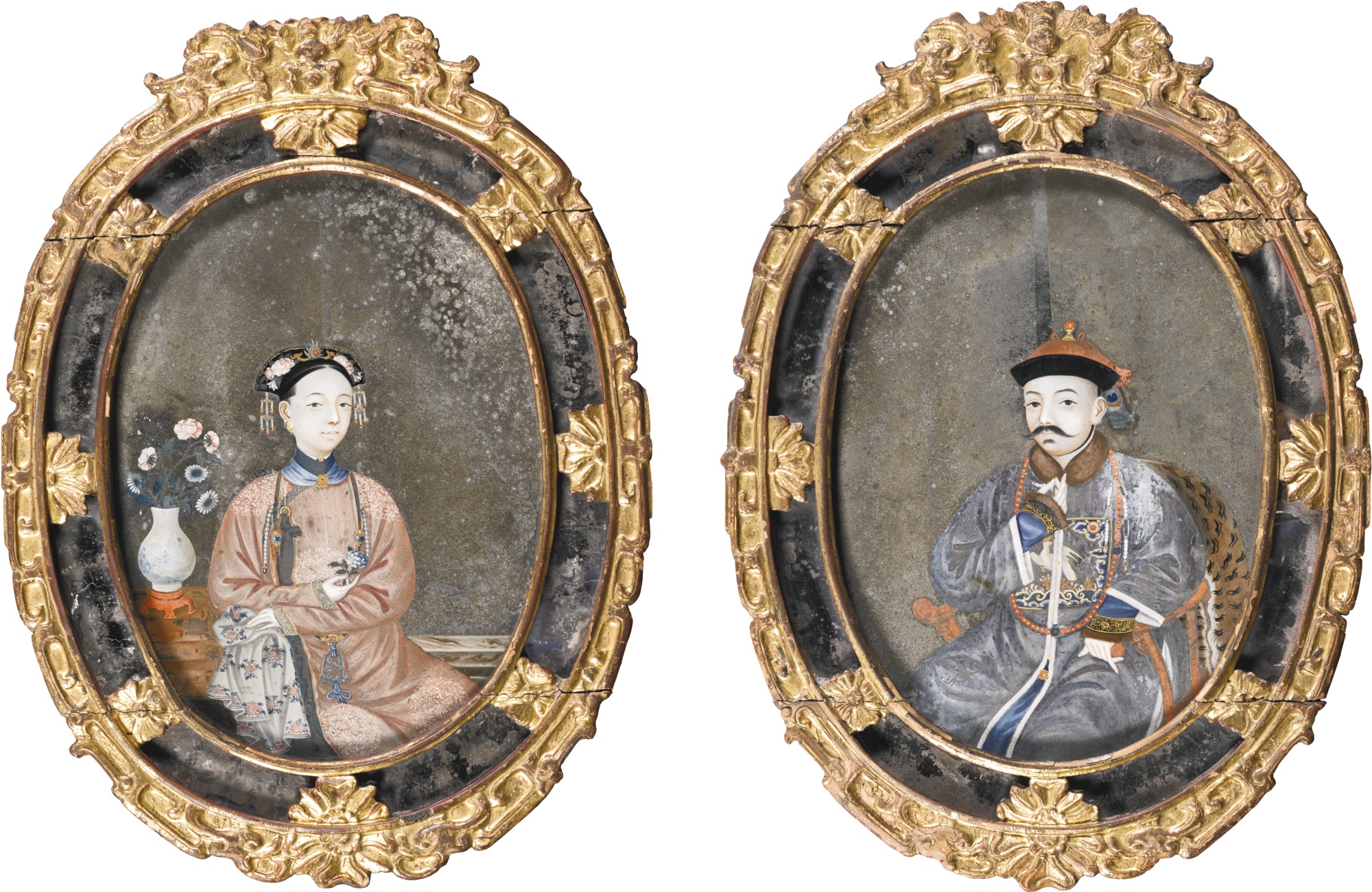 A pair of chinese export reverse painted glass mirrors, early 19th century