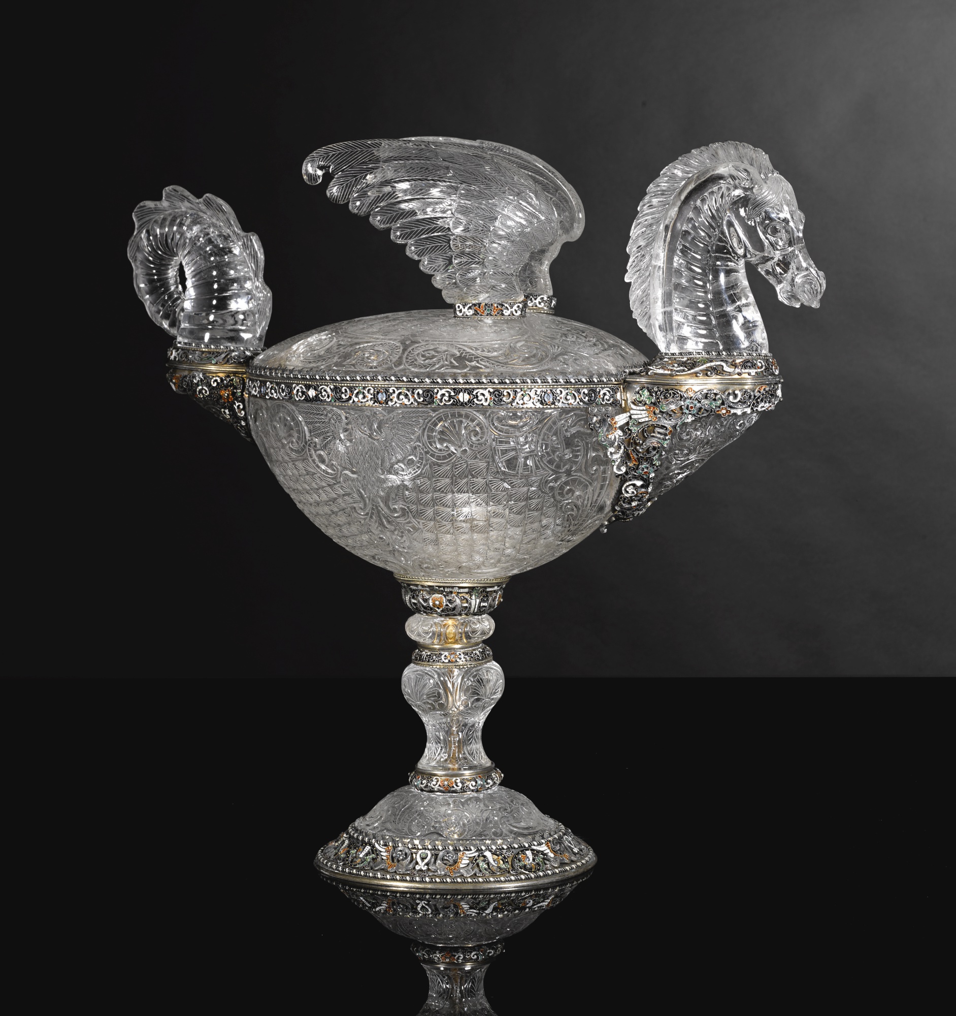 A LARGE ROCK CRYSTAL, ENAMEL AND SILVER WINGED DRAGON, HERMANN RATZERSDORFER