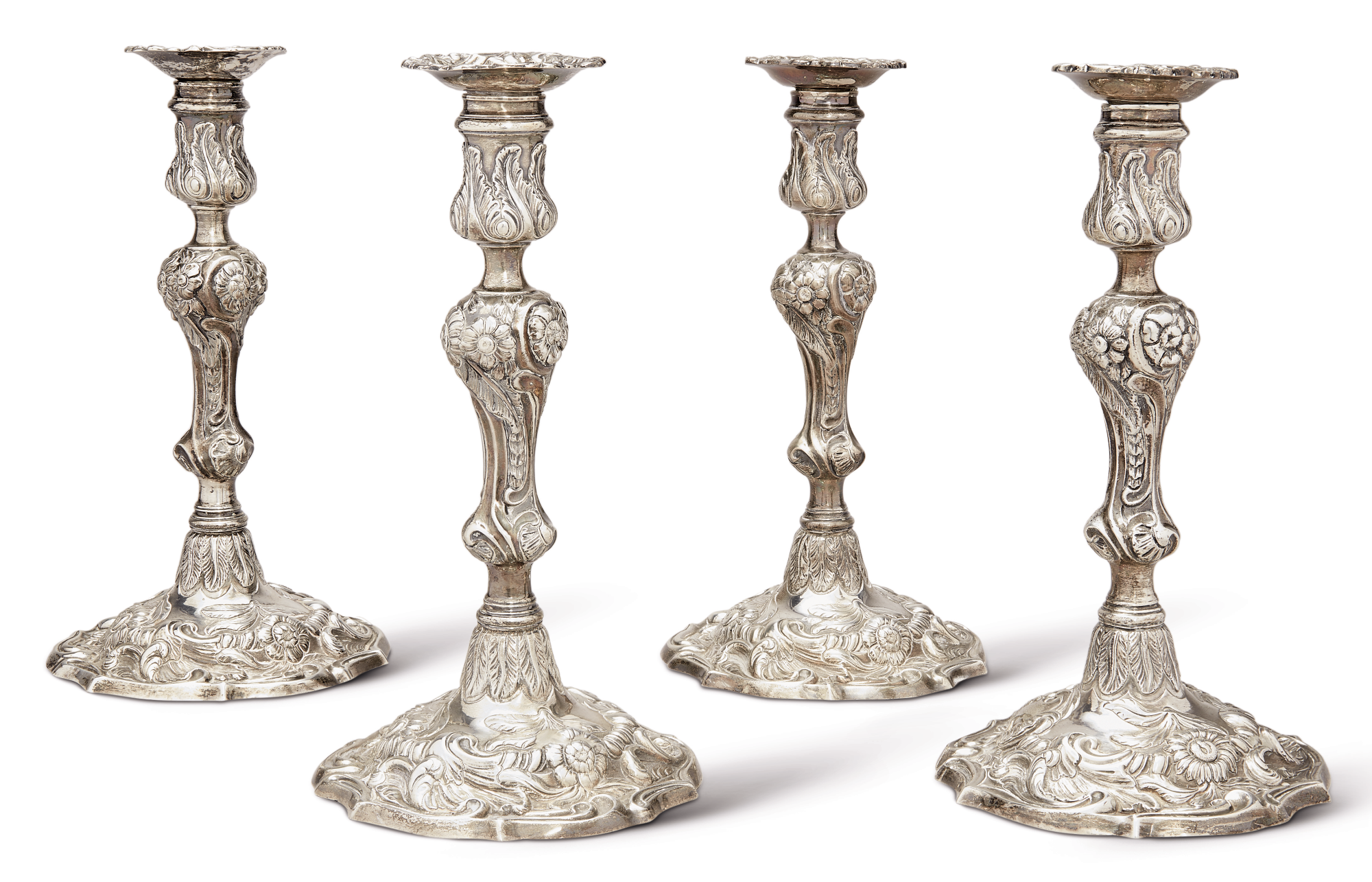 A set of four george iii silver candlesticks, ebenezer coker, london, 1768