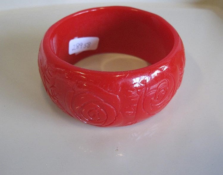 Vintage red resin bangle moulded with roses