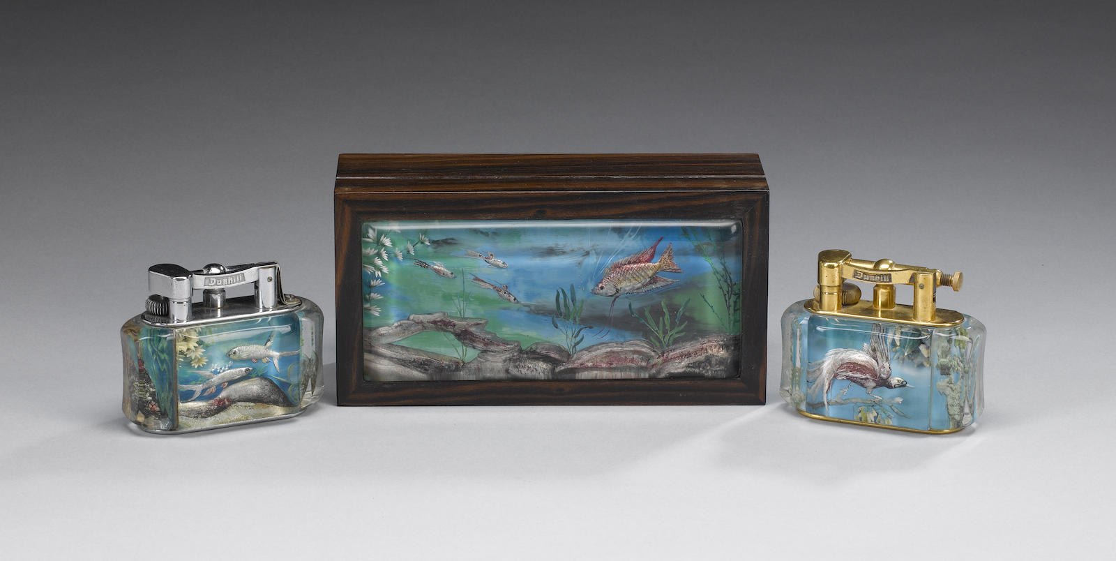 A Dunhill Aquarium zebrano wood cigarette box