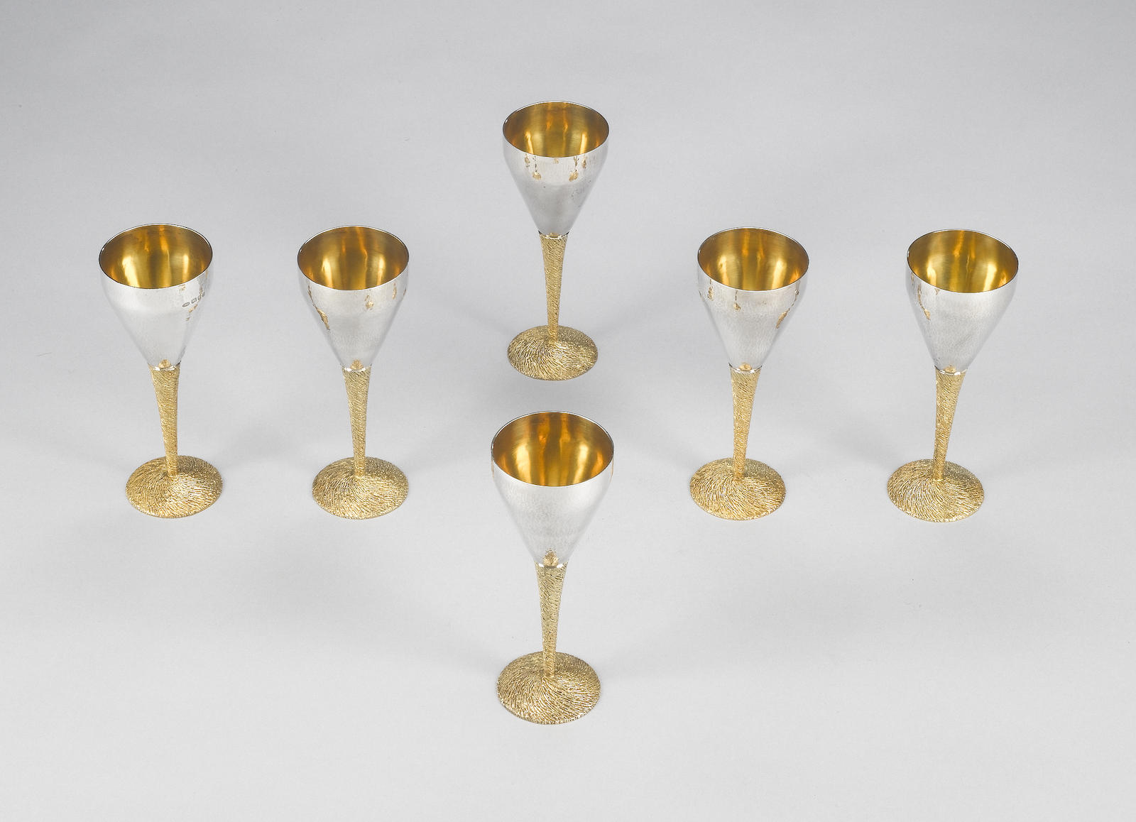STUART DEVLIN : A set of six silver and silver-gilt goblets, London 1971,
