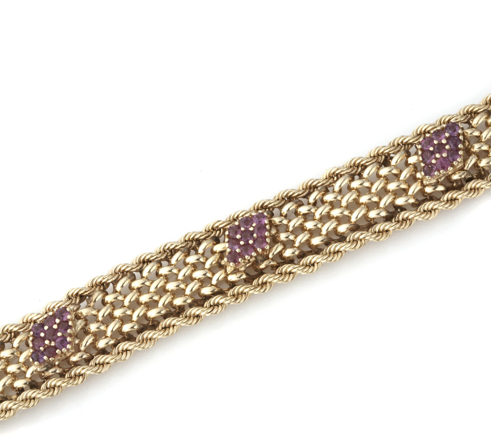 A ruby and 14k gold rope mesh bracelet