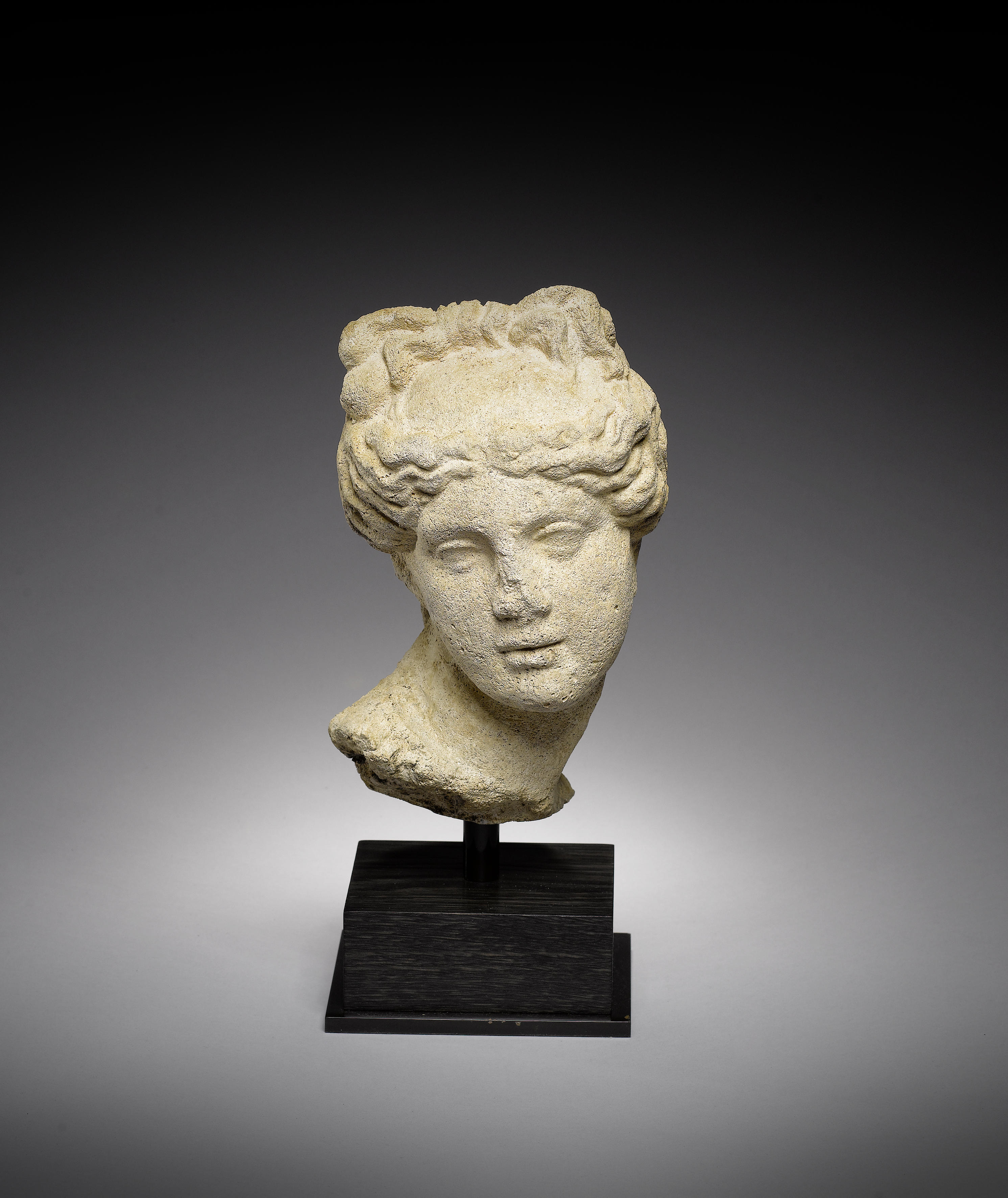 A Roman limestone head of Aphrodite