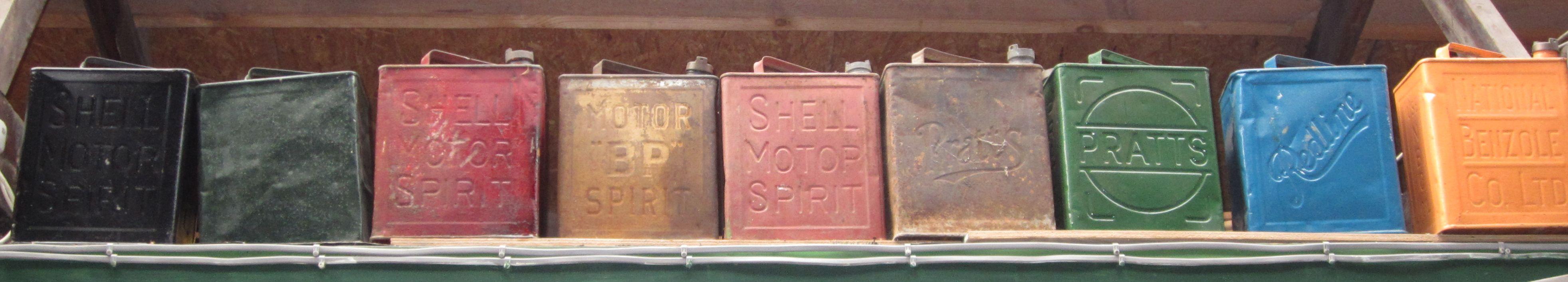 Assorted 2-gallon petrol cans,
