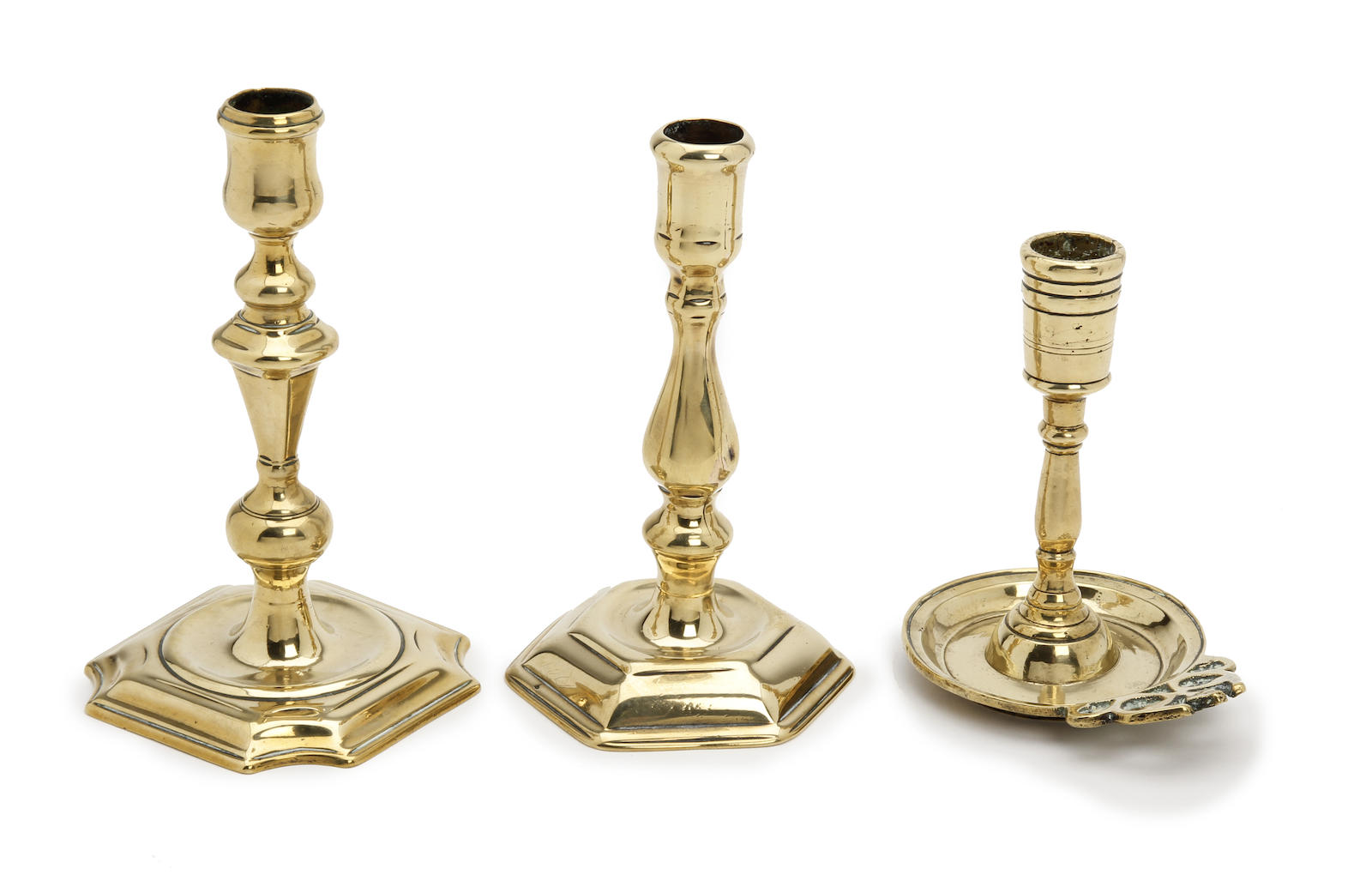 Three brass candlesticks