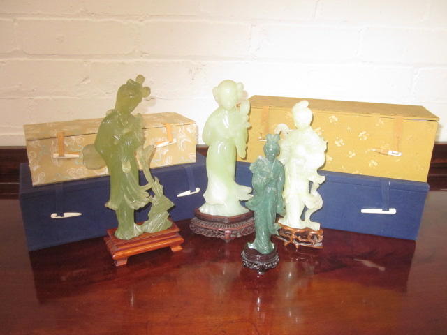 Four Chinese green hardstone carvings,