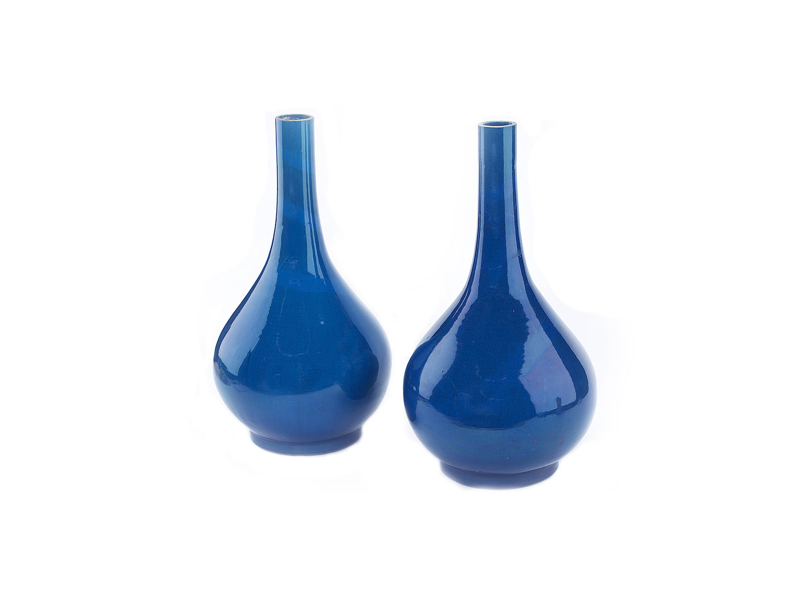A pair of Chinese turquoise glazed earthenware vases