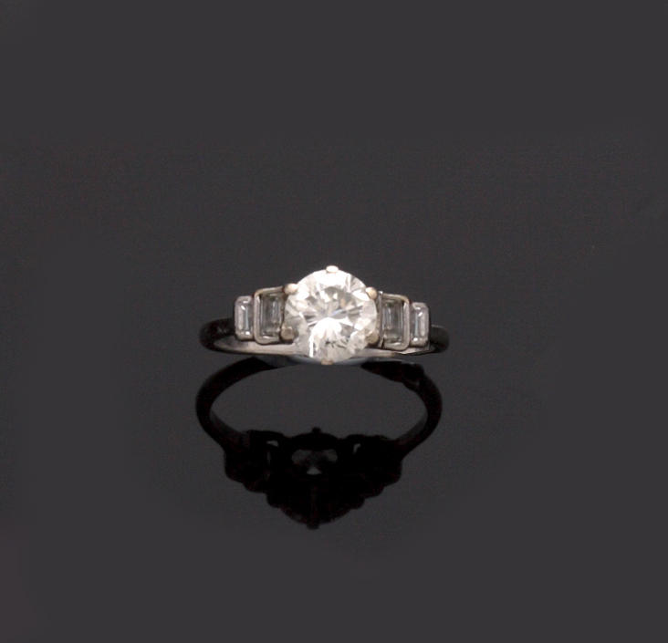 An Art Deco diamond single stone ring
