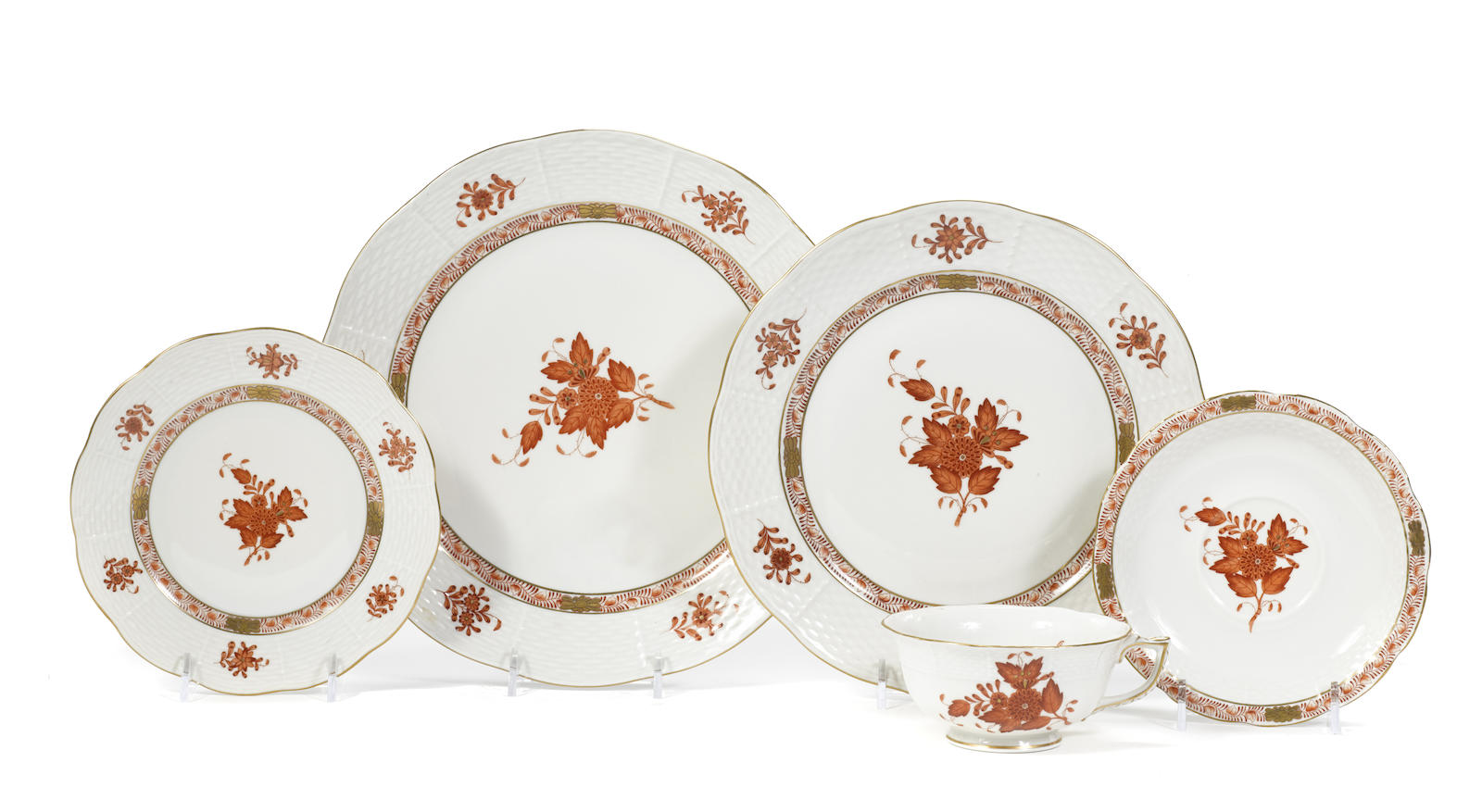 A Herend porcelain part dinner service in the Chinese Bouquet Rust pattern
