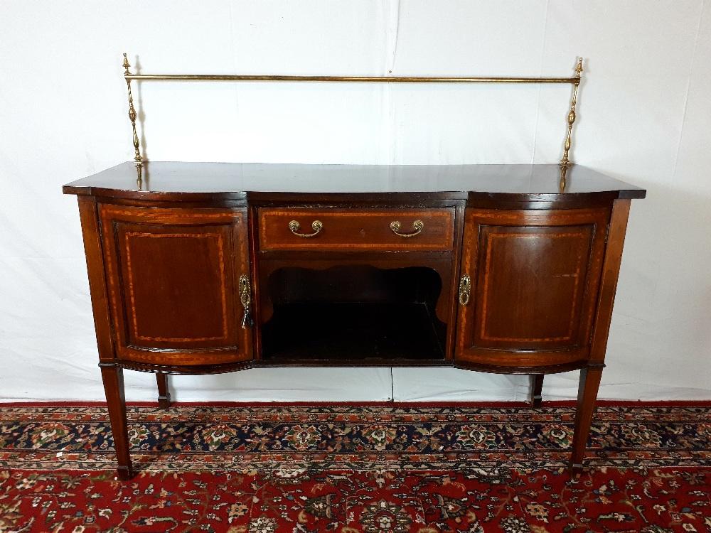 Edwardian mahogany inlaid sideboard with brass gallery.