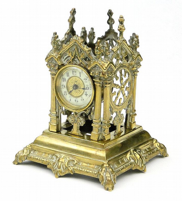 Ecclesiastical brass cased clock by the British United Clock Company
