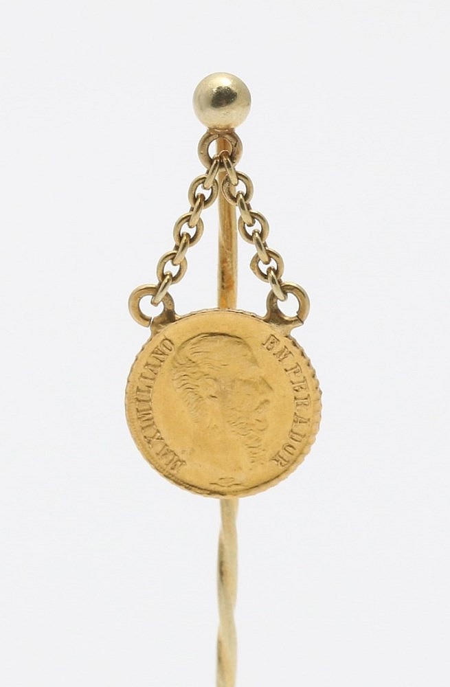 Gold tie pin.