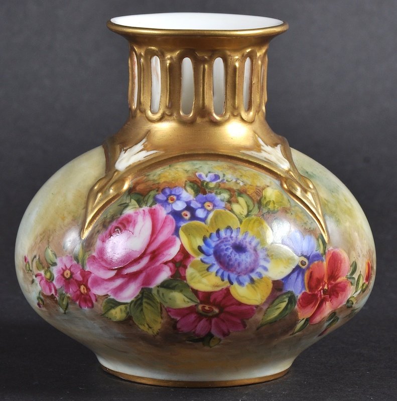 A ROYAL WORCESTER VASE with pierced neck finely painted
