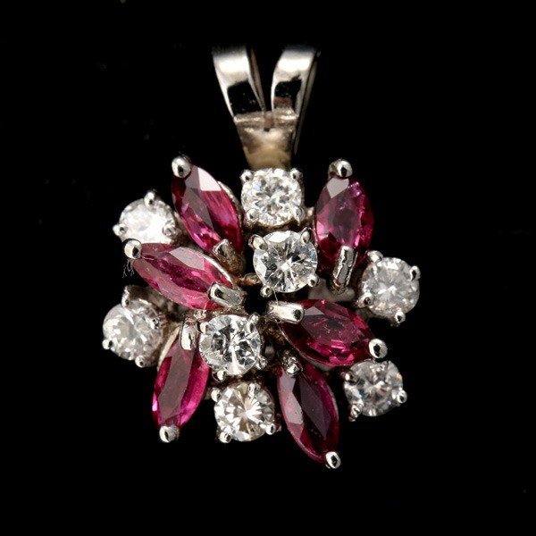 Diamond, ruby, 10k white gold pendant.
