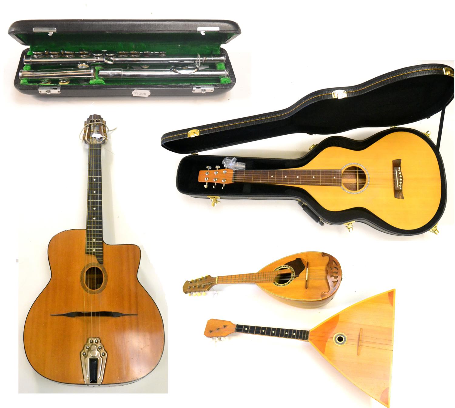 Mixed Instruments comprising a cased Chinese guitar style stringed instrument