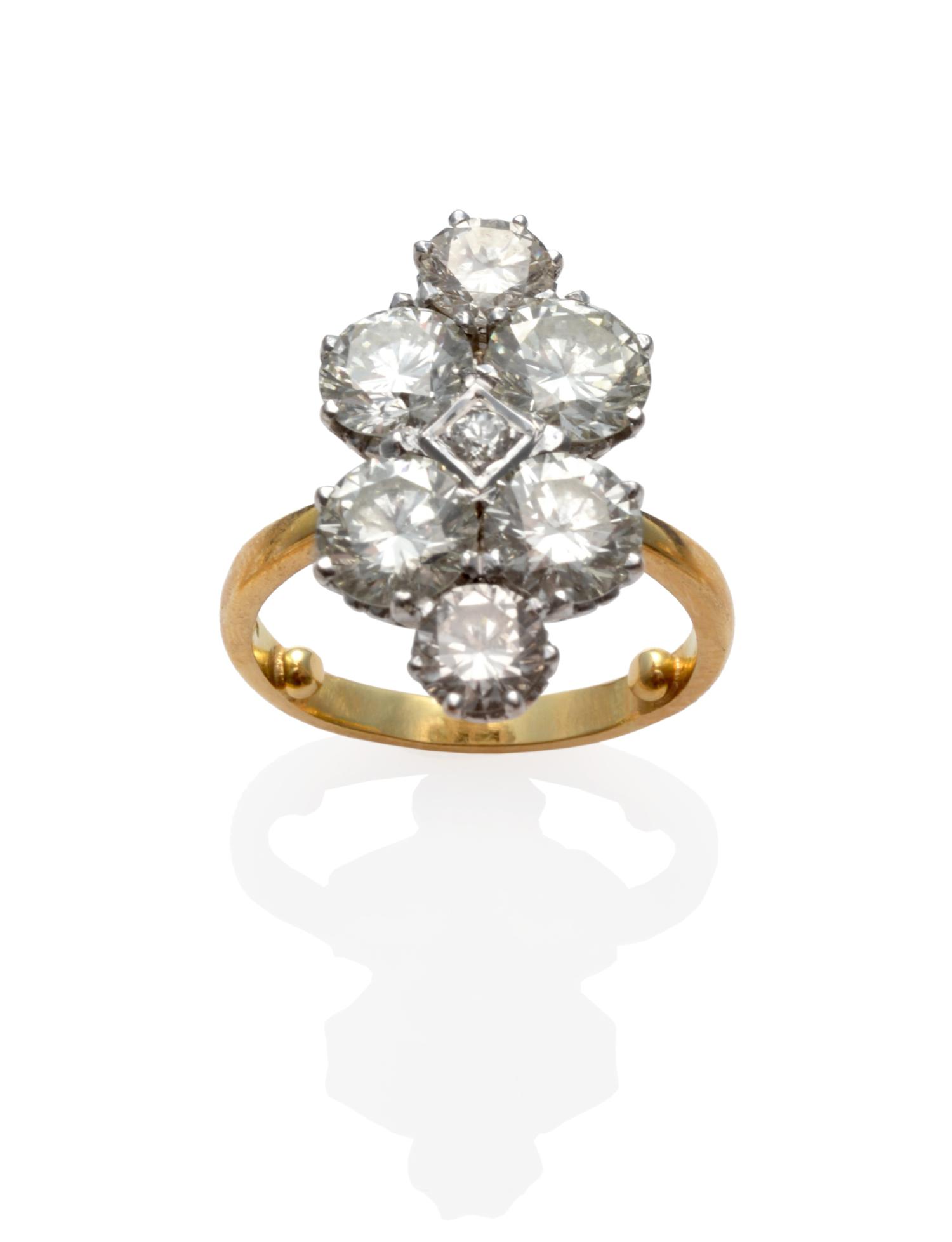 An 18 Carat Gold Diamond Seven Stone Plaque Ring